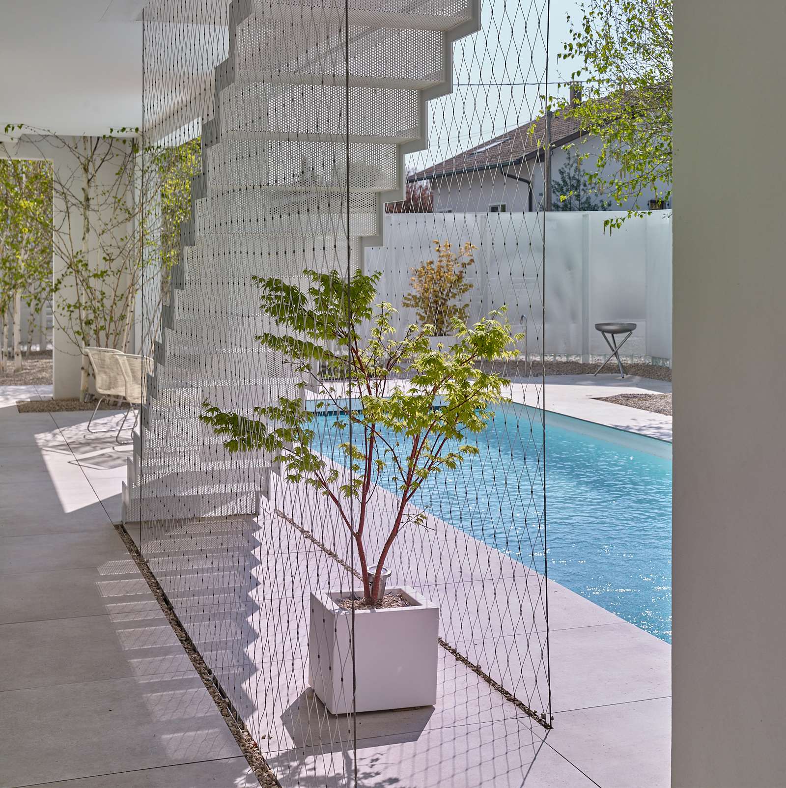 Villa par Stéphane Herrgott — plage de piscine en Tagina Apogeo, finition R11